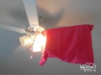 Pillow case over ceiling fan blade